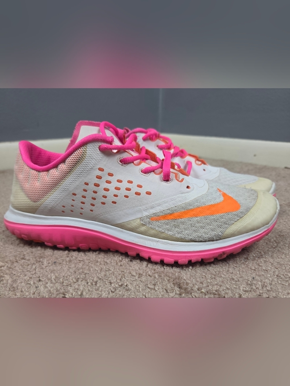 Nike Women's White Sneakers with Pink and Orange Accents